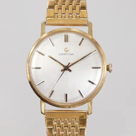 Armbandsur Certina Ø34mm, manuell, 18K i boett, doublélänk ej original, repigt plexiglas, gravyr, bruttovikt inklusive länk: 55g
