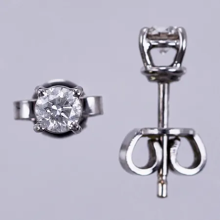 Ett par örhängen med diamanter ca 2x0,20ct W/Si2, 18K  Vikt: 1,4 g