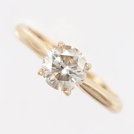 Ring med diamant ca 1,10ct, O-P,  SI2, och 26 syntetiska diamanter 0,12ctv,  enligt medföljande certifikat från IGI, stl 18, bredd: 2-7mm, 14K Vikt: 3,1 g