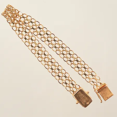 Armband X-länk, längd ca 19cm, bredd 9mm, saknar låsåtta, 18K Vikt: 11,5 g