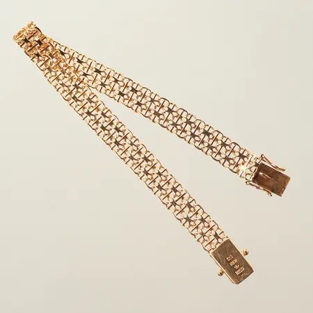 Armband, x-länk med stav, längd ca 21,5cm, bredd 9mm, 18K  Vikt: 11,5 g