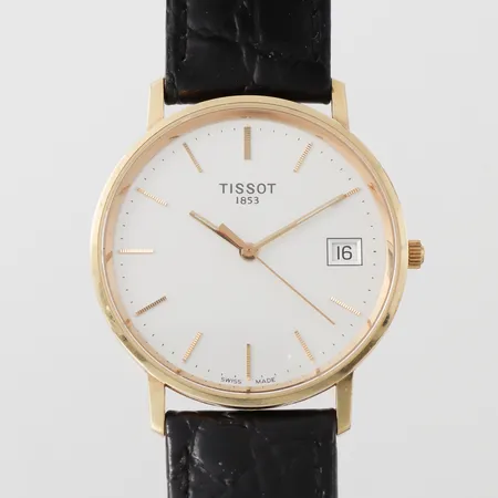Herrur Tissot, gravyr, fungerar ej troligen batteriet, diameter 33.4 mm, 14k. Vikt: 0 g