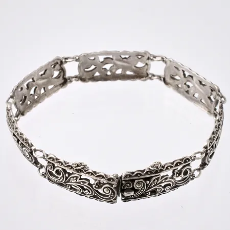 Armband i silver, 20cm, bredd 11,5cm, 20st markasiter, 8st saknas, 830/1000, importstämplad, vikt 19,34g.