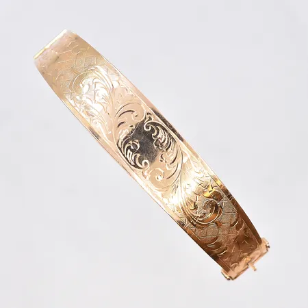 Armring, öppningsbar, Ø63, bredd 6-14mm, klämskada,18K.  Vikt: 12,7 g