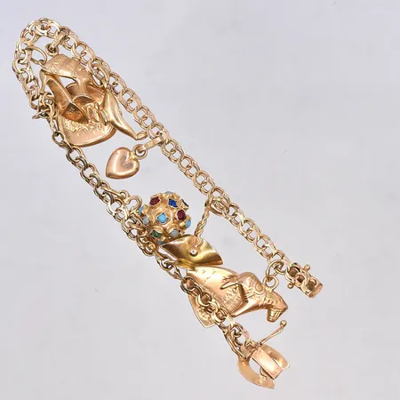 Armband Bismarck med berlocker, längd 19,5 cm, bredd länk 4 mm, 18K. Vikt: 16,7 g