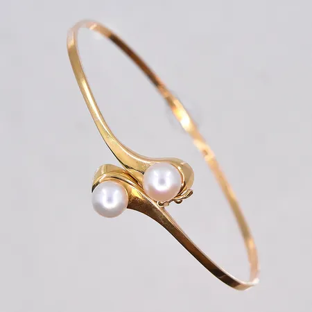 Armring med pärlor, Ø57 mm, bredd 2 mm, 18K. Vikt: 7,8 g