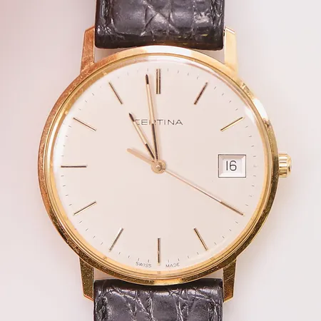 Herrur Certina 14K, 33,5mm, quartz, graverad, går ej.