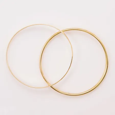 2 Armringar, skeva, bucklor, 18K 22,5g.