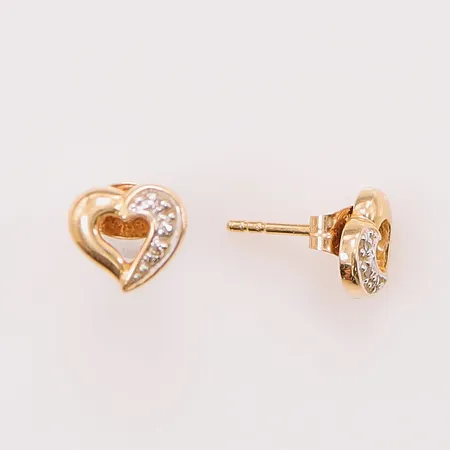 Ett par örhängen, diamanter 2x ca 0,005ct, 7mm, 18K 1,4g.
