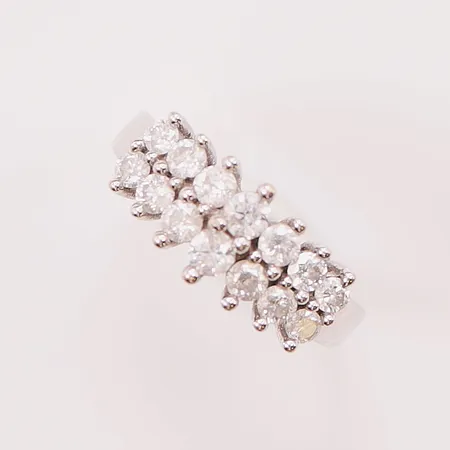 Ring, diamanter totalt ca 0,50ctv, (ca 0,04ct-0,10ct), Piqué, Ø15¾, bredd:9mm, 14K 3,8g.