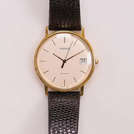 Herrur Tissot 18K, 33,5mm, quartz, originalbox, går ej, batteribyte krävs.