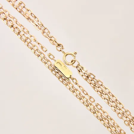 Collier treradigt, längd 52cm, bredd 2-3mm, med två lås i 18K, 14K Vikt: 22,5 g