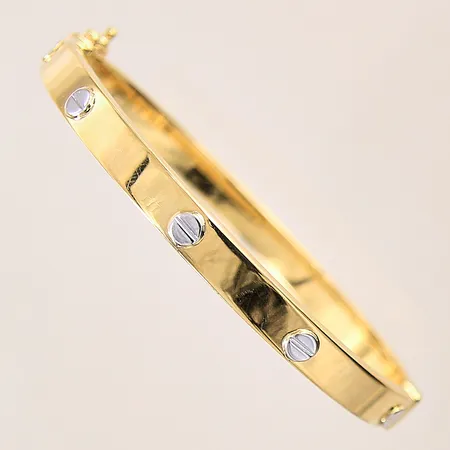 Armring, Ø61,3mm, bredd: 6mm, vitguldsdetaljer, öppningsbar, 18K, OBS! Ej märkesdesign! Vikt: 14,4 g