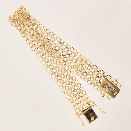 Armband X-länk, längd 19cm, bredd 14mm, SMH, år 1968, 18K Vikt: 19,9 g