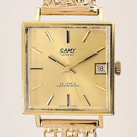 Herrur Camy Genève, 18K, automatisk, boett-nr: 163, Ø28mm, X-länk i 18K, datum, repigt plexiglas, boett med bucklor samt repor, urtavla med smuts, bruttovikt: 55g