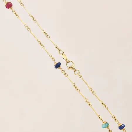 Collier med fasetterade stenar, längd 42cm, bredd 0,8-4,6mm, repiga stenar, GHA, 18K  Vikt: 6,5 g