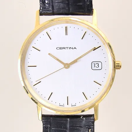 Herrur Certina, 18K, quartz, serie-nr: EOL 158.9289.68, Ø33mm, datum, safirglas, original läderband med lätt slitage, repig boett, fungerar ej, batteribyte krävs, gravyr, bruttovikt: 28,9g