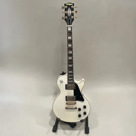 Elgitarr El Dégas Les Paul Custom Copy, 6-strängar i stål, troligen tillverkad i Japan, troligen 70-tal, två mindre sprickor undertill, repor, stötmärken, ytslitage, hårt fodral Skickas med Bussgods eller PostNord