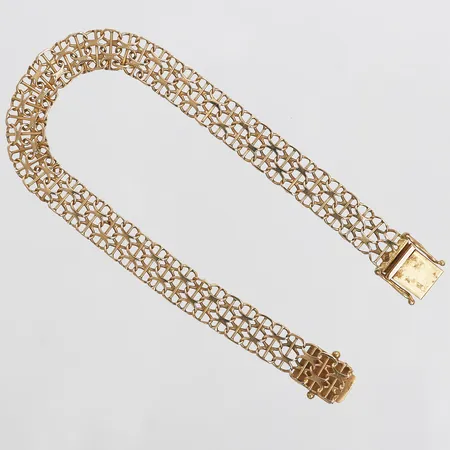 Armband, X-länk med stav, längd: 20 cm, bredd: 8 mm, 18K guld. Vikt: 10,8 g