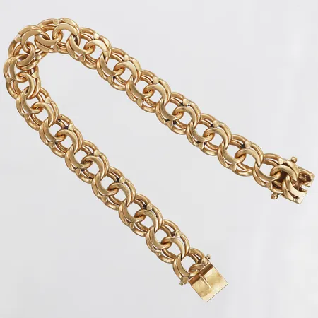Armband, Bismarck, längd: 21 cm, bredd: 12 mm, låsåttor saknas, 18K guld. Vikt: 53,6 g
