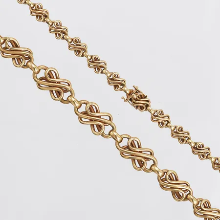 Collier, doserat, längd: 41,5cm, bredd: 6,5 - 11 mm, 18K guld. Vikt: 18,6 g