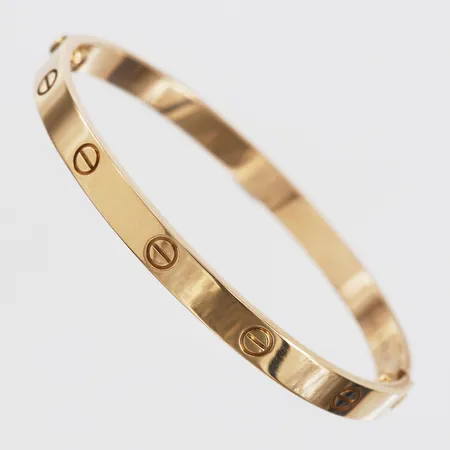 Armband, Cartier, Love Bracelet, serienr: CUC242, certifikat från London, daterat 27/05 - 2016, bruksslitage, stl: 20, 18K roséguld, skruvmejsel i metall, bok, originalkartong, ytterkartong, samt påse.   Vikt: 37,6 g