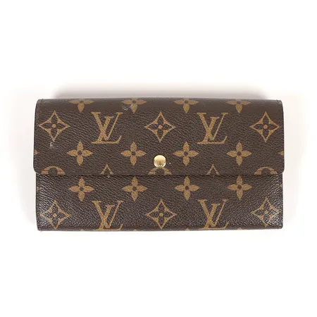 Plånbok, Louis Vuitton, monogramcanvas, enligt datumkod Spanien 2012, ca 10x19x2,5cm, bruksslitage, några fläckar. 