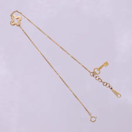 Vristlänk med integrerat hänge, längd 20-23cm, bredd 1-11mm, 18K.  Vikt: 2,9 g