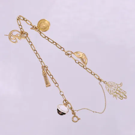 Armband Ankar med sex berlocker, längd ca 18,5cm, bredd 2,5mm, säkerhetskedja, 18K. Vikt: 9 g