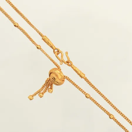 Collier, längd 42,5cm, bredd 1,8mm, något ojämn länk, 1 Baht, Thaiguld, 23K  Vikt: 15,2 g