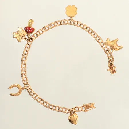 Armband Bismarck, sex berlocker, längd 18,5cm, bredd 4,2mm, M.K:S Guldsmedsatelje Mary Kvoch, år 1958, 18K Vikt: 8,3 g
