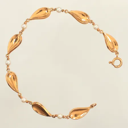 Armband, odlade pärlor, längd 19cm, bredd 2,4-7,6mm, 18K Vikt: 4 g