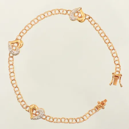 Armband Bismarck, hjärtan med diamanter 15xca0,005ct, längd 18,5cm, bredd 3,2-9,5mm, GFAB, 18K Vikt: 5,7 g