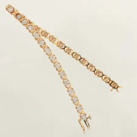 Armband, diamanter 240xca0,005ct, längd 19cm, bredd 4,7mm, GHA, 18K  Vikt: 13,3 g