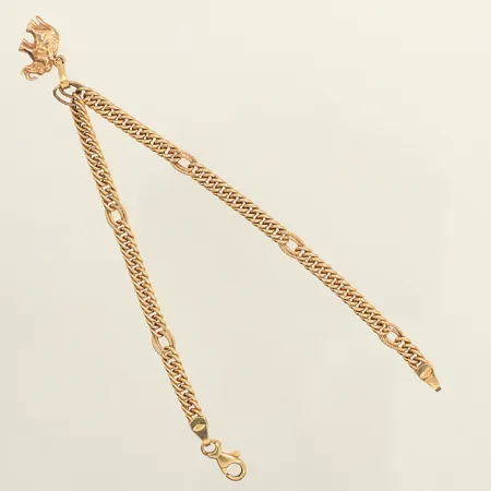 Armband, längd 18,5cm, bredd 4,2mm, en berlock elefant, 14K  Vikt: 4 g