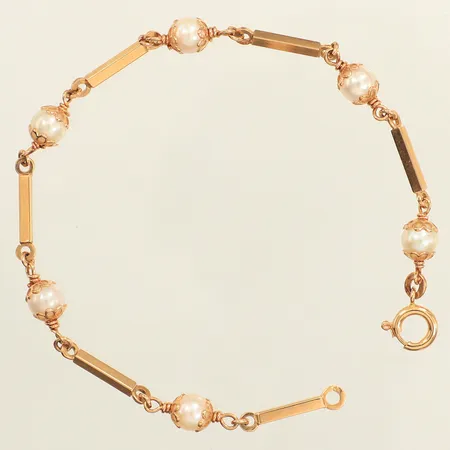 Armband, pärlor Ø5,8mm, längd 19cm, bredd 1,9mm, 18K Vikt: 6,1 g