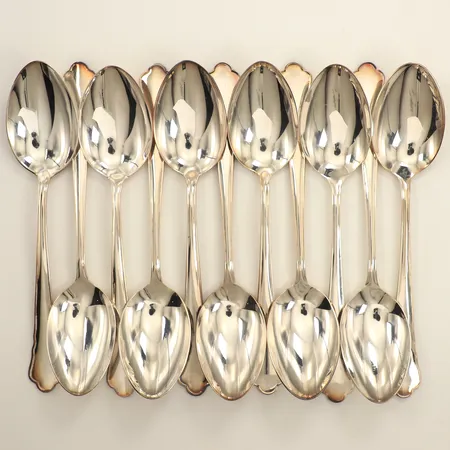 Elva bordsskedar, längd 18cm, modell Chippendale, tyglinda, silver 830/1000 Vikt: 506,2 g
