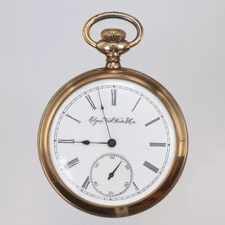 Fickur Elgin  Natl. Watch Co Ø51mm snr 7257935, boett nr 702924, USA, gulddoublé, ca 1910-tal, romersk urtavla (liten emaljskada), glas med litet nagg, liten sekundvisare, blånerade visare 