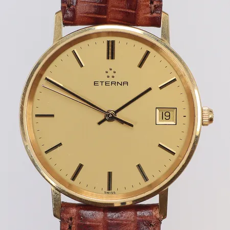 Herrur Eterna 14K Ø33,5mm quartz (går ej, i behov av batteribyte) datum, gravyr, originalläderband (visst slitage), guld i boett, bruttovikt 