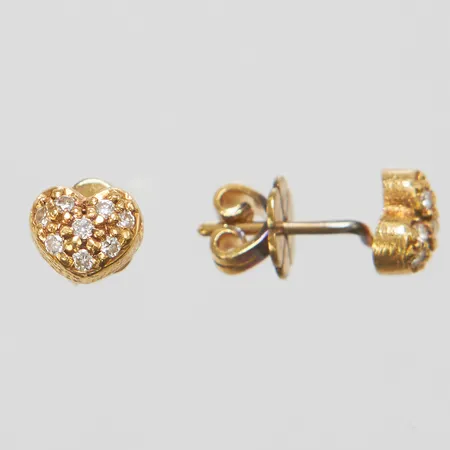 Ett par örhängen, diamanter 16 x ca 0,005-0,01ct, Ø ca 5,5-7mm, lödningar på stoppers, 18K Vikt: 2,9 g