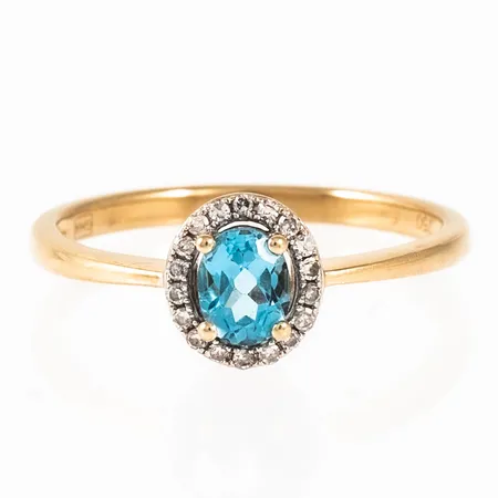 Ring i 18K guld med en turkos blå sten och 18 x c:a 0,005ct diamanter. Den är 1,7 - 7,7 mm bred, är i storlek 17 och väger 2,1g. Stämplad GHA (Guldfynd/Hallbergs) & 750. 