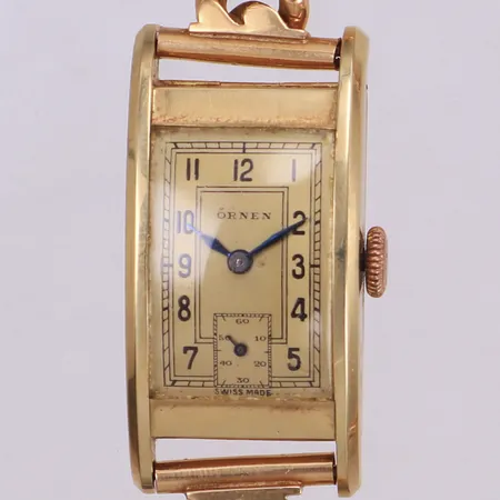 Herrur Örnen 14K, 38x20mm, manuell, boettnr: 103354, liten sekundvisare, repor, armband pansarlänk i 18K, säkerhetskedja, längd inklusive uret: ca 19cm, bruttovikt 62,8g Vikt: 62,8 g
