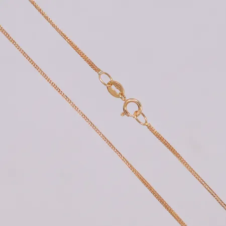 Kedja, längd 39,5cm, bredd 0,8mm, smärre ojämnheter på länken, 18K Vikt: 1,3 g
