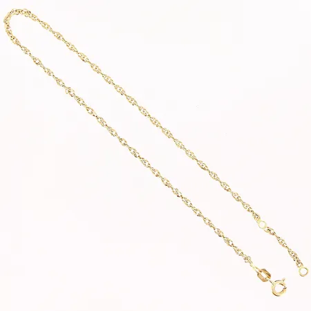 Vristlänk, Singapore, 23/25cm, bredd 1,5mm, GHA, skevheter på länk,18K. Vikt: 2,2 g