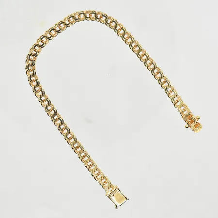 Armband Bismarck, längd 18½ cm, bredd 5 mm, 18K. Vikt: 9 g