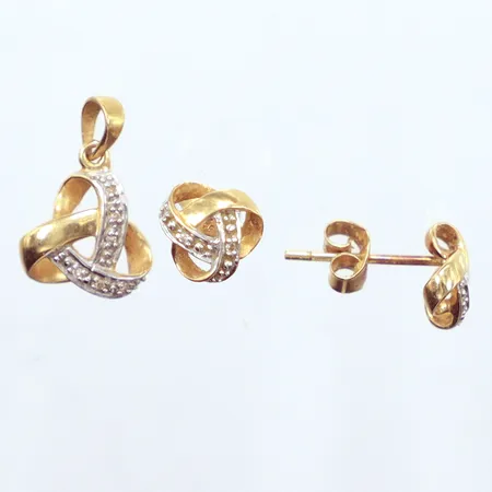 Ett set, hänge tvåfärgat, vita stenar, längd 16,4mm, bredd 10,6mm, vita stenar, ett par örhängen tvåfärgade, Ø8,2mm, vita stenar, 18K Vikt: 2,8 g