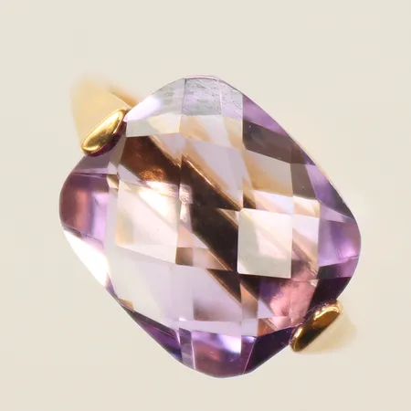 Ring med lila sten, stl 16¾, bredd 2-11mm, 18K, bruttovikt 5,3g 