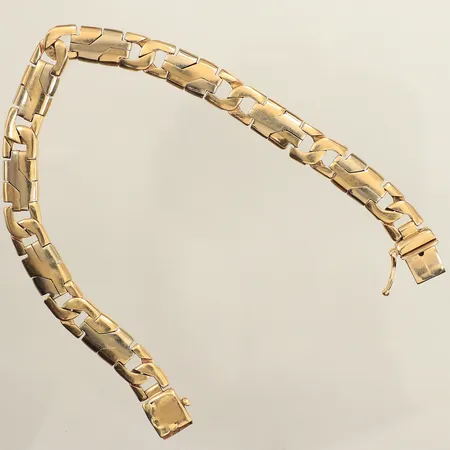Armband, längd 21cm, bredd 8,6mm, trasigt lås, 14K  Vikt: 27,1 g