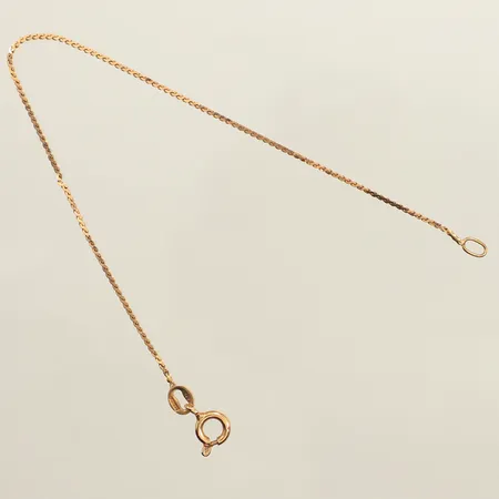 Armband, ca 16cm, bredd ca 1mm, något ojämn länk, 14K Vikt: 0,8 g
