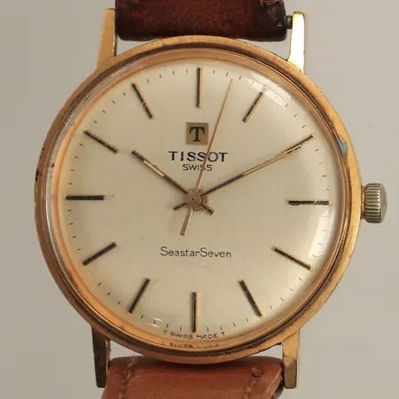 Herrur Tissot, Seastar Seven, manuell, Ø34mm, boett i 18K, läderband, gravyr, repig, inga tillbehör, bruttovikt: 32,7g. 
